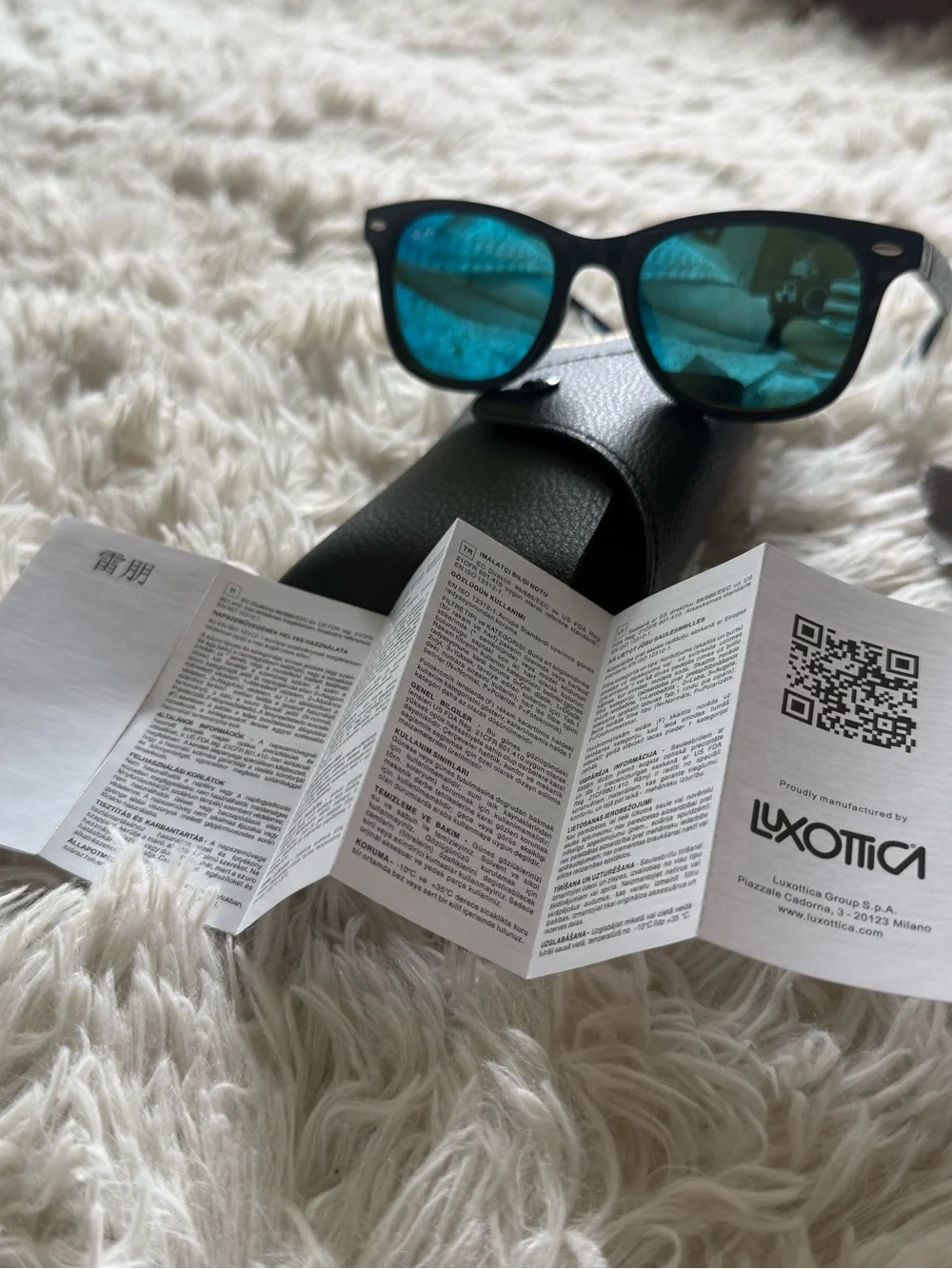 Ray-Ban Black Frame Sunglasses with Blue Mirrored Lenses